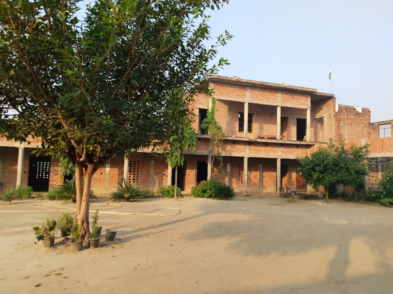 The two-storey S.D.R.D. Public Inter College school building under a clear sky