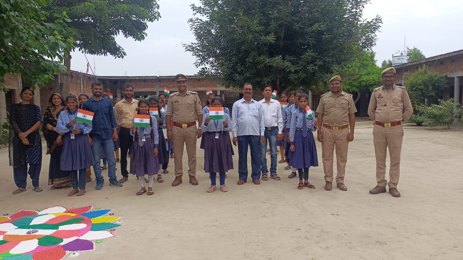 Local police officers visiting the school with students